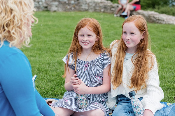 Two girls enjoying a picnic